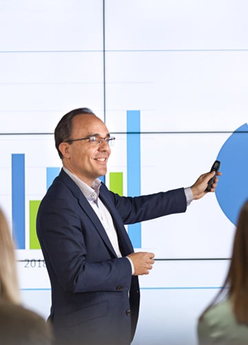 Worker explaining charts
