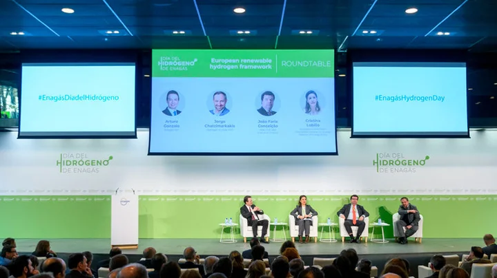Professionals at a round table during the event