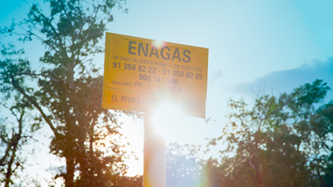 Enagás landmark with trees in the background
