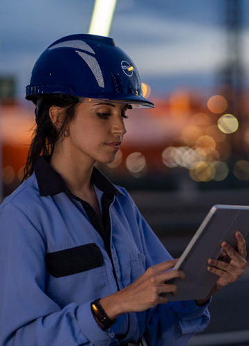 Woman focused on a tablet