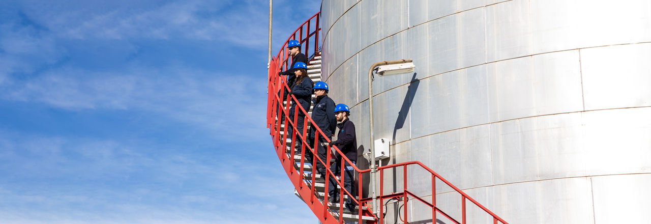 Group of operators working at a terminal