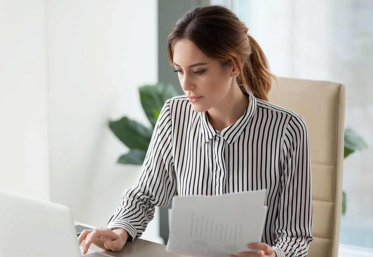 Female employer working with a computer