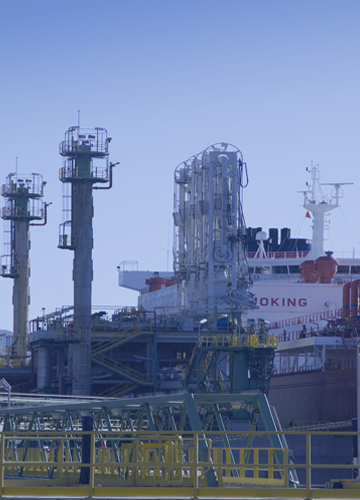 LNG tanker unloading at a regasification terminal